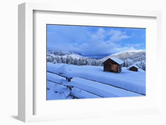 Old snow-covered huts during twilight, Erbe Pass, Funes Valley, Sudtirol (South Tyrol), Dolomites, -Francesco Bergamaschi-Framed Photographic Print