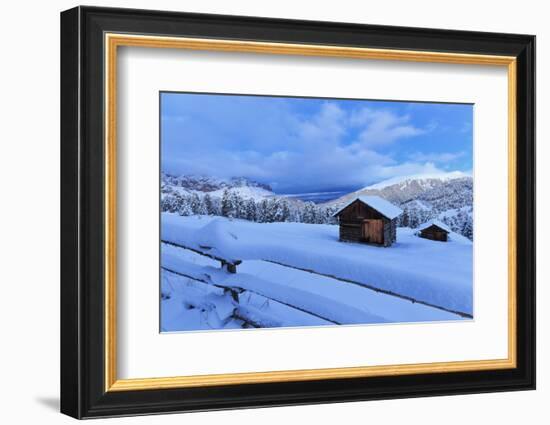 Old snow-covered huts during twilight, Erbe Pass, Funes Valley, Sudtirol (South Tyrol), Dolomites, -Francesco Bergamaschi-Framed Photographic Print