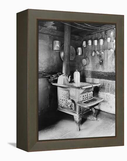 Old Stove inside Log Cabin Kitchen-null-Framed Premier Image Canvas