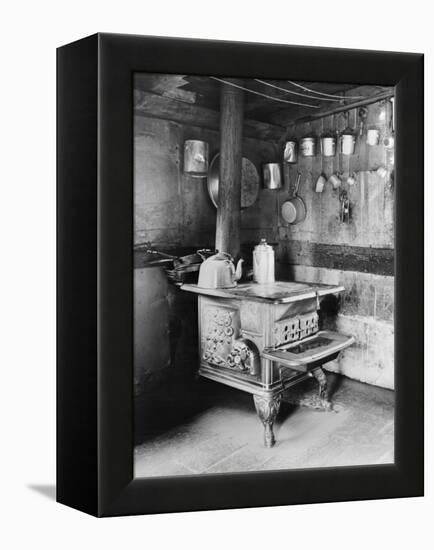 Old Stove inside Log Cabin Kitchen-null-Framed Premier Image Canvas