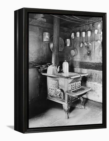 Old Stove inside Log Cabin Kitchen-null-Framed Premier Image Canvas