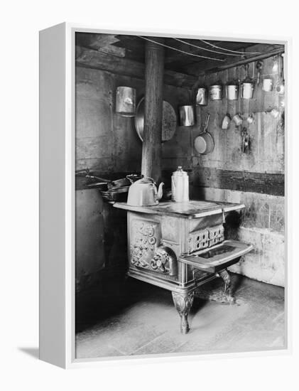 Old Stove inside Log Cabin Kitchen-null-Framed Premier Image Canvas