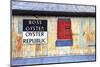 Old Tin Building with Red Shutters, Apalachicola, Florida, USA-Joanne Wells-Mounted Photographic Print