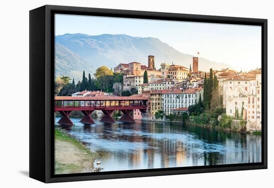 Old town of Bassano Del Grappa overlooking river Brenta at sunrise, Vicenza province, Veneto, Italy-Roberto Moiola-Framed Premier Image Canvas