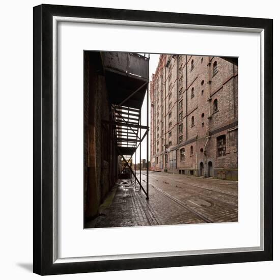 Old Tramlines in Cobbled Street with Shipping Warehouses in Liverpool, Merseyside, England, UK-Paul McMullin-Framed Photo