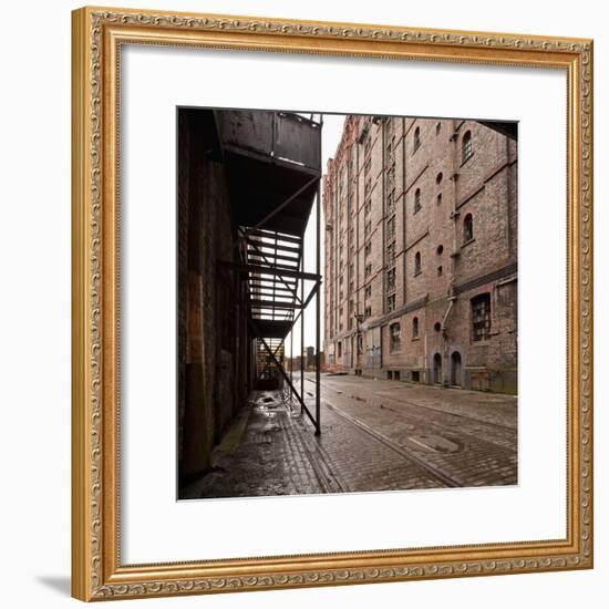 Old Tramlines in Cobbled Street with Shipping Warehouses in Liverpool, Merseyside, England, UK-Paul McMullin-Framed Photo