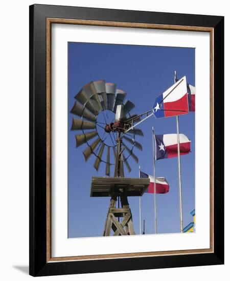 Old Water Pump and Texas State Flags, Amarillo, Texas-Walter Bibikow-Framed Photographic Print