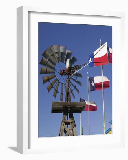 Old Water Pump and Texas State Flags, Amarillo, Texas-Walter Bibikow-Framed Photographic Print