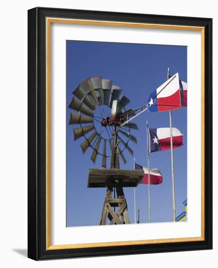 Old Water Pump and Texas State Flags, Amarillo, Texas-Walter Bibikow-Framed Photographic Print