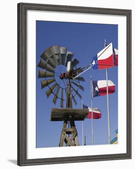 Old Water Pump and Texas State Flags, Amarillo, Texas-Walter Bibikow-Framed Photographic Print