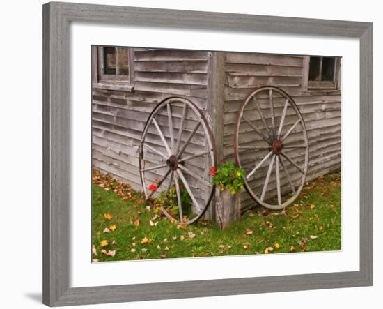 Old Wooden Barn with Wagon Wheels in Rural New England, Maine, USA-Joanne Wells-Framed Photographic Print