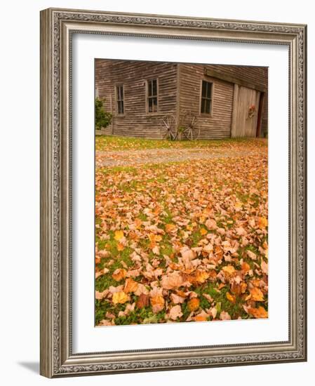 Old Wooden Barn with Wagon Wheels in Rural New England, Maine, USA-Joanne Wells-Framed Photographic Print