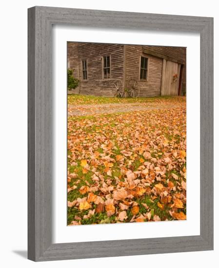 Old Wooden Barn with Wagon Wheels in Rural New England, Maine, USA-Joanne Wells-Framed Photographic Print