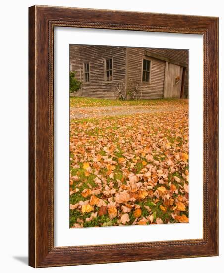 Old Wooden Barn with Wagon Wheels in Rural New England, Maine, USA-Joanne Wells-Framed Photographic Print