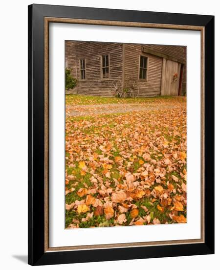 Old Wooden Barn with Wagon Wheels in Rural New England, Maine, USA-Joanne Wells-Framed Photographic Print