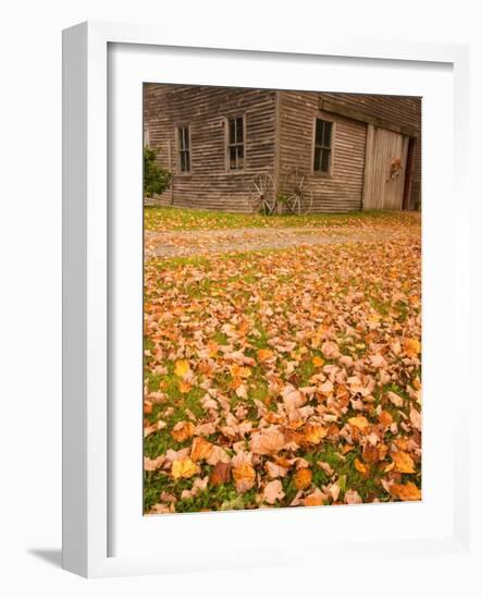 Old Wooden Barn with Wagon Wheels in Rural New England, Maine, USA-Joanne Wells-Framed Photographic Print