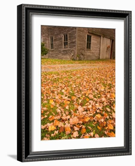 Old Wooden Barn with Wagon Wheels in Rural New England, Maine, USA-Joanne Wells-Framed Photographic Print