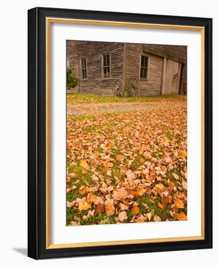 Old Wooden Barn with Wagon Wheels in Rural New England, Maine, USA-Joanne Wells-Framed Photographic Print