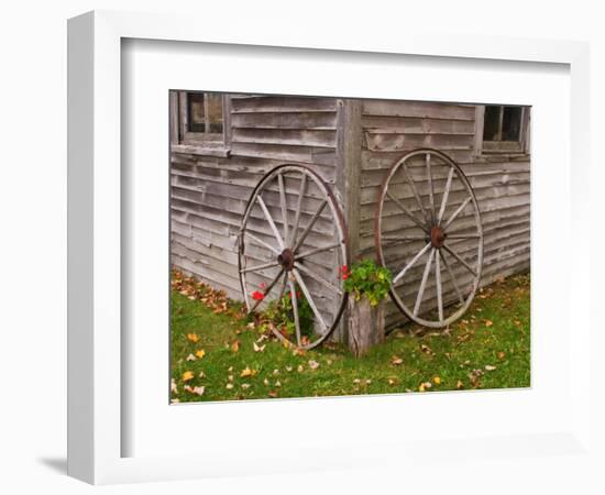 Old Wooden Barn with Wagon Wheels in Rural New England, Maine, USA-Joanne Wells-Framed Photographic Print