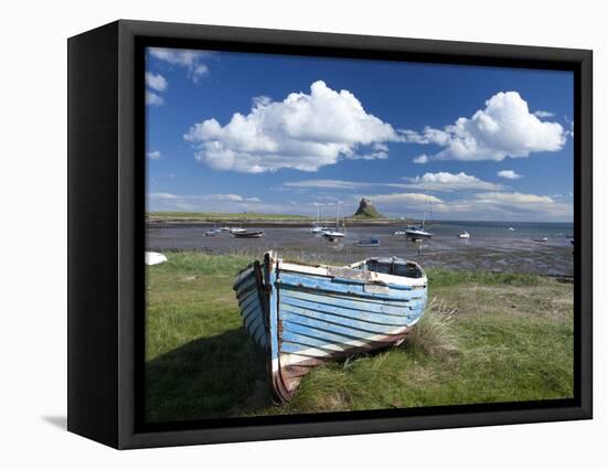 Old Wooden Fishing Boat on a Grassy Bank with Lindisfarne Harbour and Lindisfarne Castle, Holy Isla-Lee Frost-Framed Premier Image Canvas