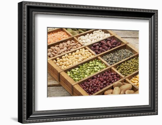 Old Wooden Typesetter Box with 16 Samples of Assorted Legumes: Green, Red and French Lentils, Soybe-PixelsAway-Framed Photographic Print