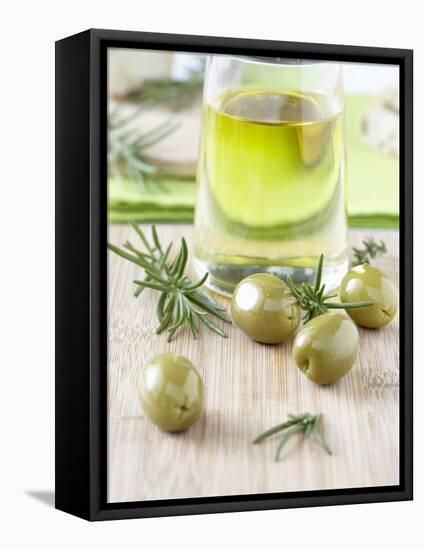 Olive Oil, Green Olives and Rosemary on Chopping Board-Jo Kirchherr-Framed Premier Image Canvas