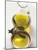 Olive Oil with Olive Branch in Bowl in Front of Carafe-null-Mounted Photographic Print