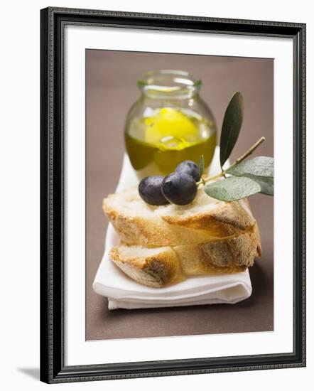 Olive Sprig with Black Olives on White Bread, Olive Oil Behind-null-Framed Photographic Print