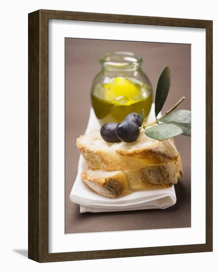 Olive Sprig with Black Olives on White Bread, Olive Oil Behind-null-Framed Photographic Print