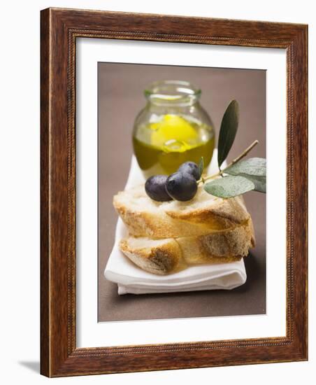 Olive Sprig with Black Olives on White Bread, Olive Oil Behind-null-Framed Photographic Print