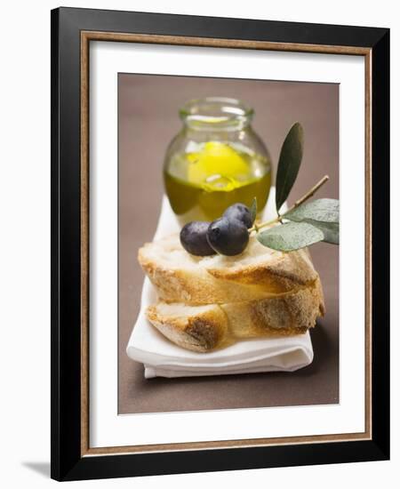 Olive Sprig with Black Olives on White Bread, Olive Oil Behind-null-Framed Photographic Print