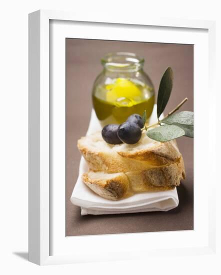 Olive Sprig with Black Olives on White Bread, Olive Oil Behind-null-Framed Photographic Print