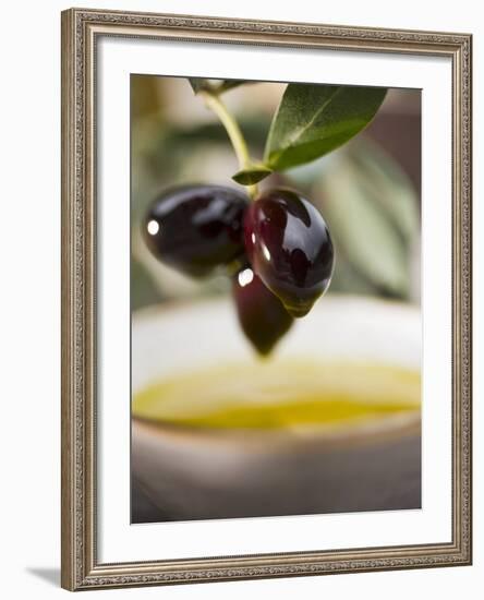 Olive Sprig with Black Olives over Bowl of Olive Oil-null-Framed Photographic Print