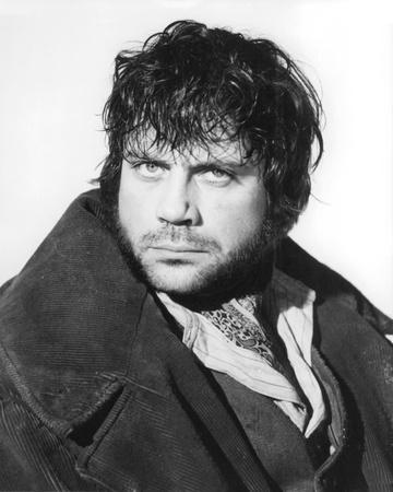 Oliver Reed, mid-haircut when filming The Devils.