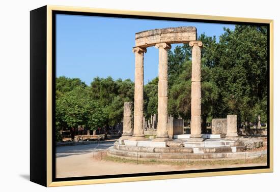 Olympia, Peloponnese, Greece. Ancient Olympia. The Philippeion, 4th century BC. Remains of a cir...-null-Framed Premier Image Canvas