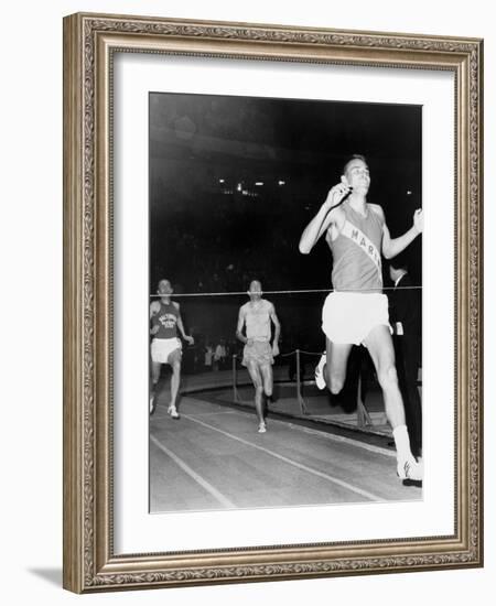 Olympic Champion, Billy Mills, Wins the Three-Mile Run Madison Square Garden, 1965-null-Framed Photo