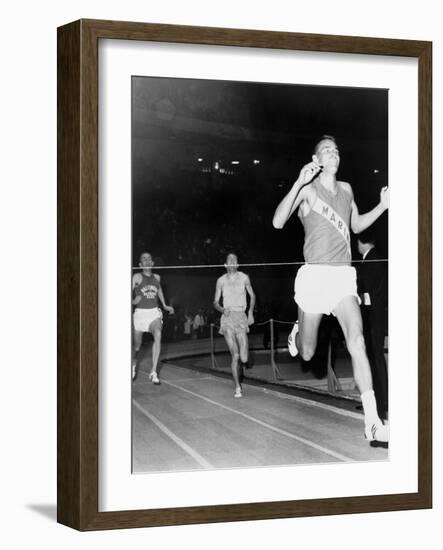 Olympic Champion, Billy Mills, Wins the Three-Mile Run Madison Square Garden, 1965-null-Framed Photo