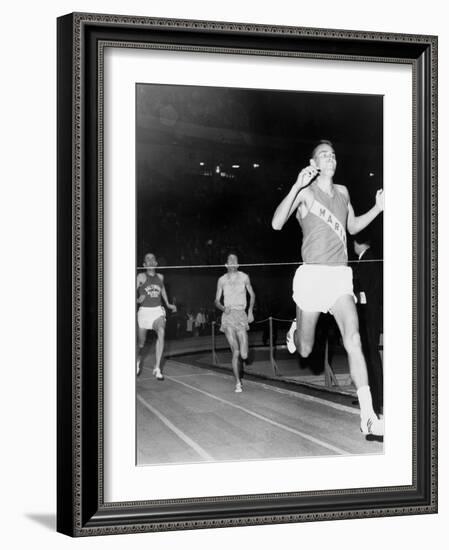 Olympic Champion, Billy Mills, Wins the Three-Mile Run Madison Square Garden, 1965-null-Framed Photo