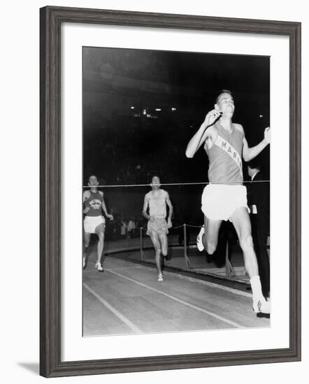 Olympic Champion, Billy Mills, Wins the Three-Mile Run Madison Square Garden, 1965-null-Framed Photo