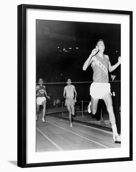 Olympic Champion, Billy Mills, Wins the Three-Mile Run Madison Square Garden, 1965-null-Framed Photo