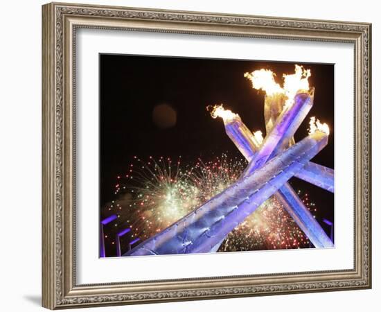 Olympic Flame Burns after the Opening Ceremony of the Vancouver 2010 Olympics-null-Framed Photographic Print