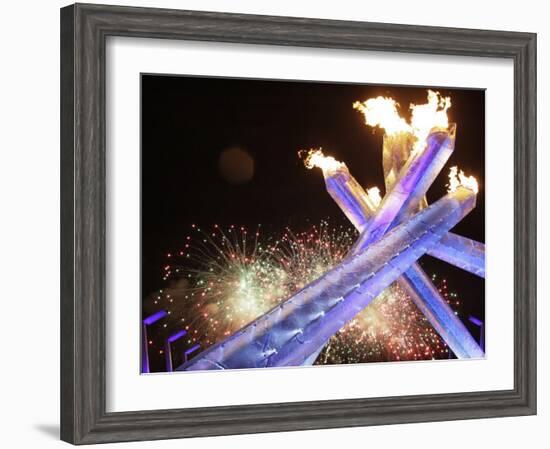 Olympic Flame Burns after the Opening Ceremony of the Vancouver 2010 Olympics-null-Framed Photographic Print