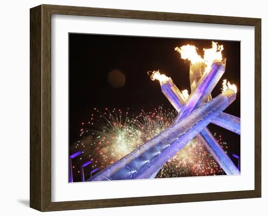 Olympic Flame Burns after the Opening Ceremony of the Vancouver 2010 Olympics-null-Framed Photographic Print