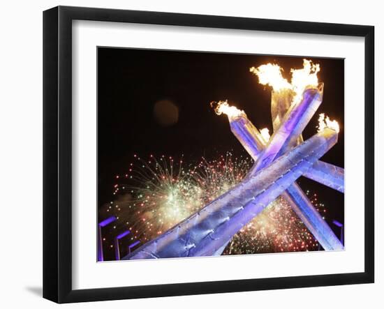 Olympic Flame Burns after the Opening Ceremony of the Vancouver 2010 Olympics-null-Framed Photographic Print