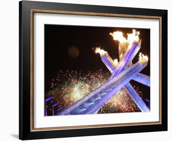 Olympic Flame Burns after the Opening Ceremony of the Vancouver 2010 Olympics-null-Framed Photographic Print