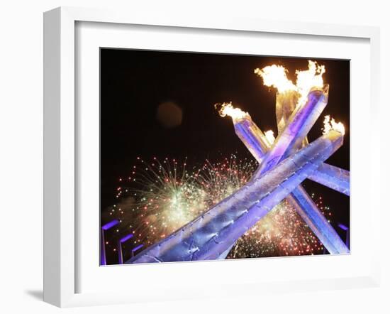 Olympic Flame Burns after the Opening Ceremony of the Vancouver 2010 Olympics-null-Framed Photographic Print