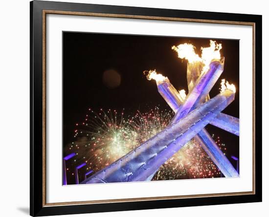 Olympic Flame Burns after the Opening Ceremony of the Vancouver 2010 Olympics-null-Framed Photographic Print