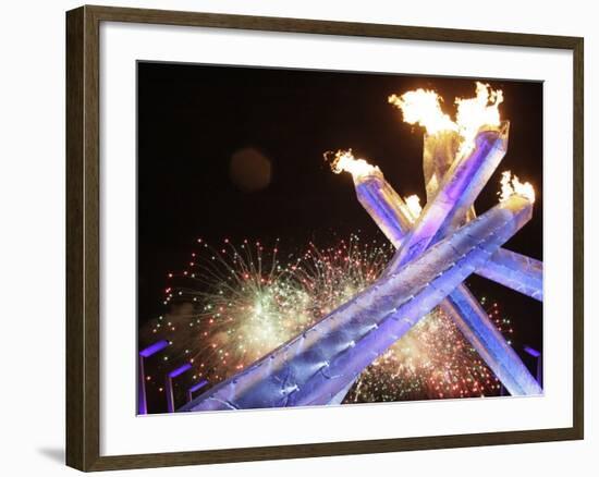 Olympic Flame Burns after the Opening Ceremony of the Vancouver 2010 Olympics-null-Framed Photographic Print