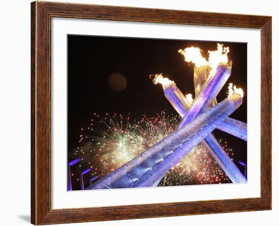 Olympic Flame Burns after the Opening Ceremony of the Vancouver 2010 Olympics-null-Framed Photographic Print