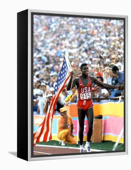 Olympic Games in Los Angeles, 1984 : 100M : Carl Lewis Winner-null-Framed Stretched Canvas